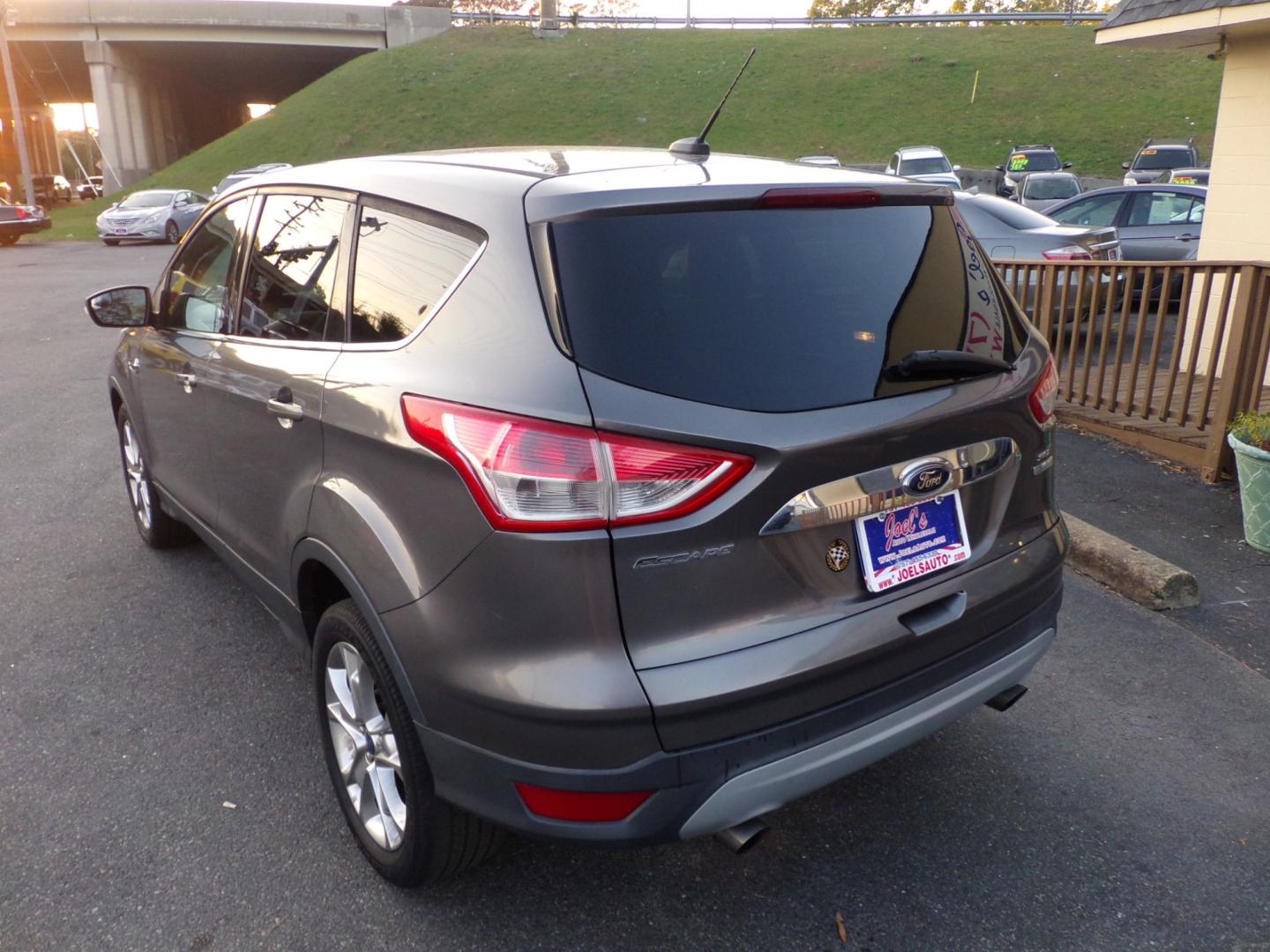 2013 Grey Ford Escape SEL FWD (1FMCU0H96DU) with an 2.0L L4 DOHC 16V engine, 6-Speed Automatic transmission, located at 5700 Curlew Drive, Norfolk, VA, 23502, (757) 455-6330, 36.841885, -76.209412 - Photo#11